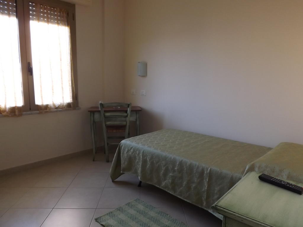 Hotel Sagittario San Sperate Pokoj fotografie